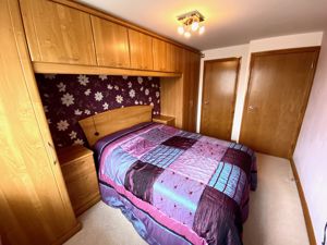Bedroom One- click for photo gallery